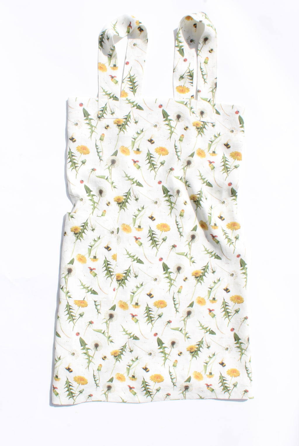 Linen cross back apron Dandelion Bloom